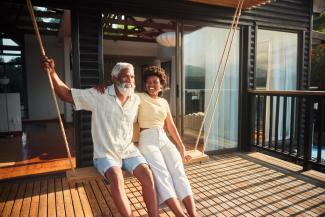 grandpa-granddaughter-on-a-porch-swing